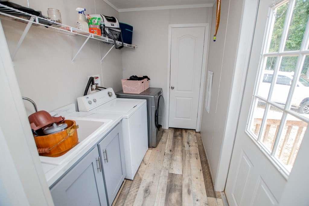 200 Duck Pond Road Roopville, GA 30170 - Photo 41 of 89 a utility room with dryer and washer