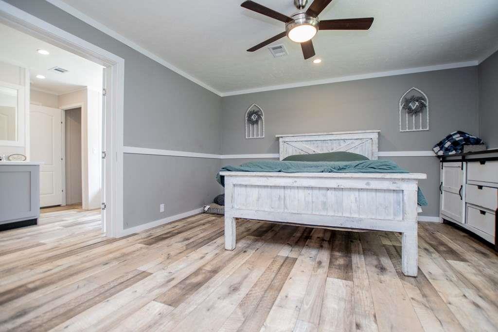 200 Duck Pond Road Roopville, GA 30170 - Photo 42 of 89 a bedroom with a bed and a table