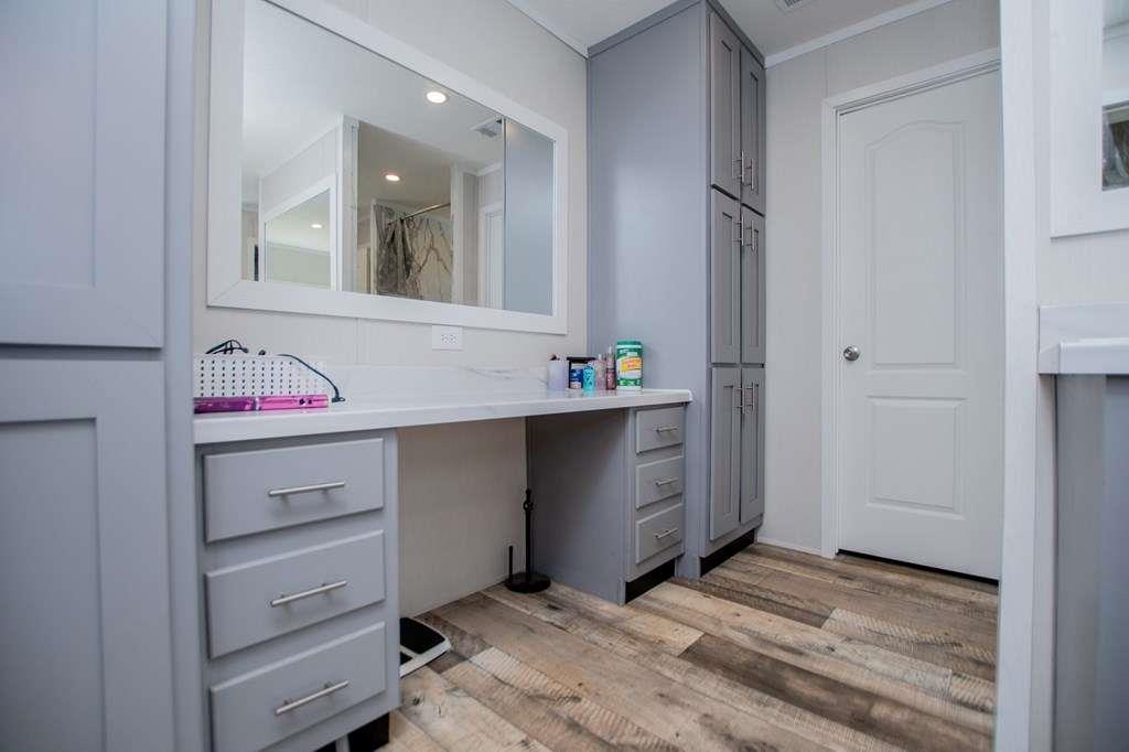 200 Duck Pond Road Roopville, GA 30170 - Photo 50 of 89 a bathroom with a sink vanity and mirror