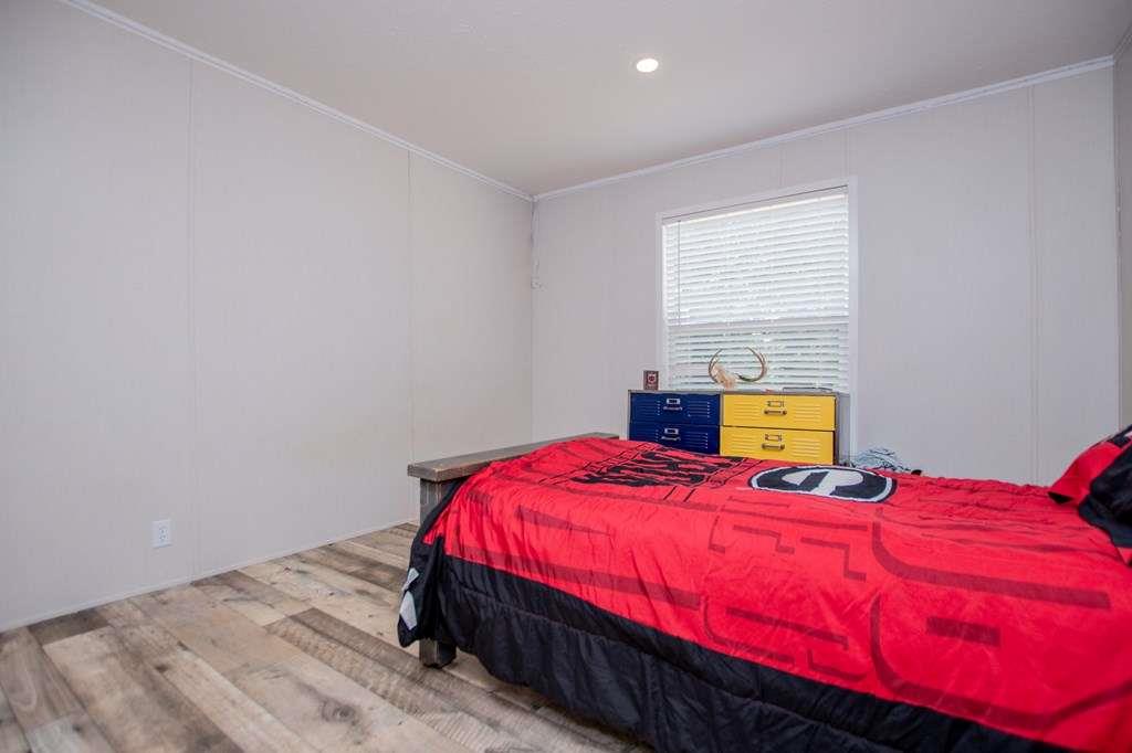 200 Duck Pond Road Roopville, GA 30170 - Photo 52 of 89 a bedroom with a bed and window