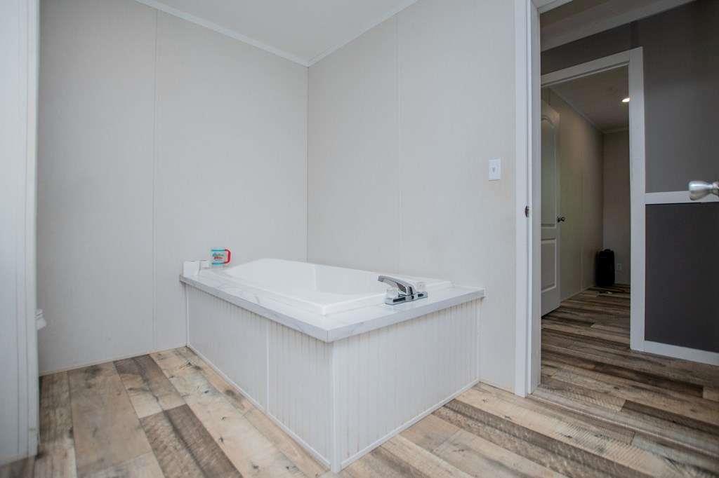 200 Duck Pond Road Roopville, GA 30170 - Photo 59 of 89 a utility room with a sink dryer and washer