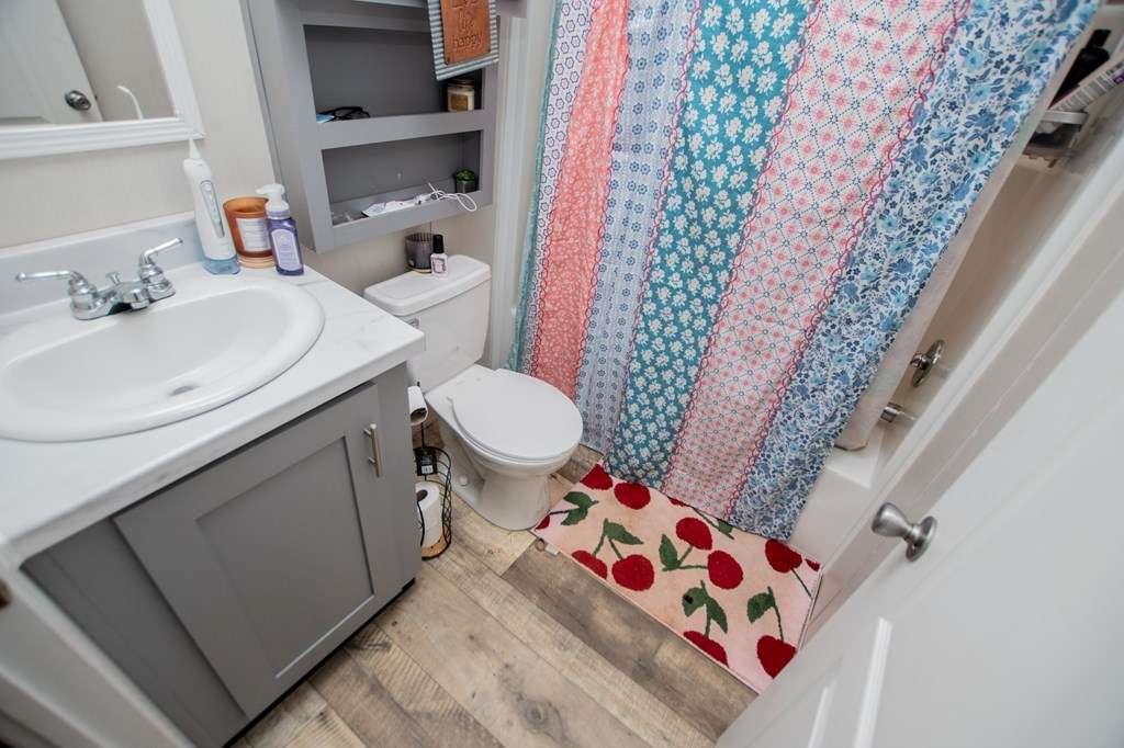 200 Duck Pond Road Roopville, GA 30170 - Photo 62 of 89 a bathroom with a sink and toilet