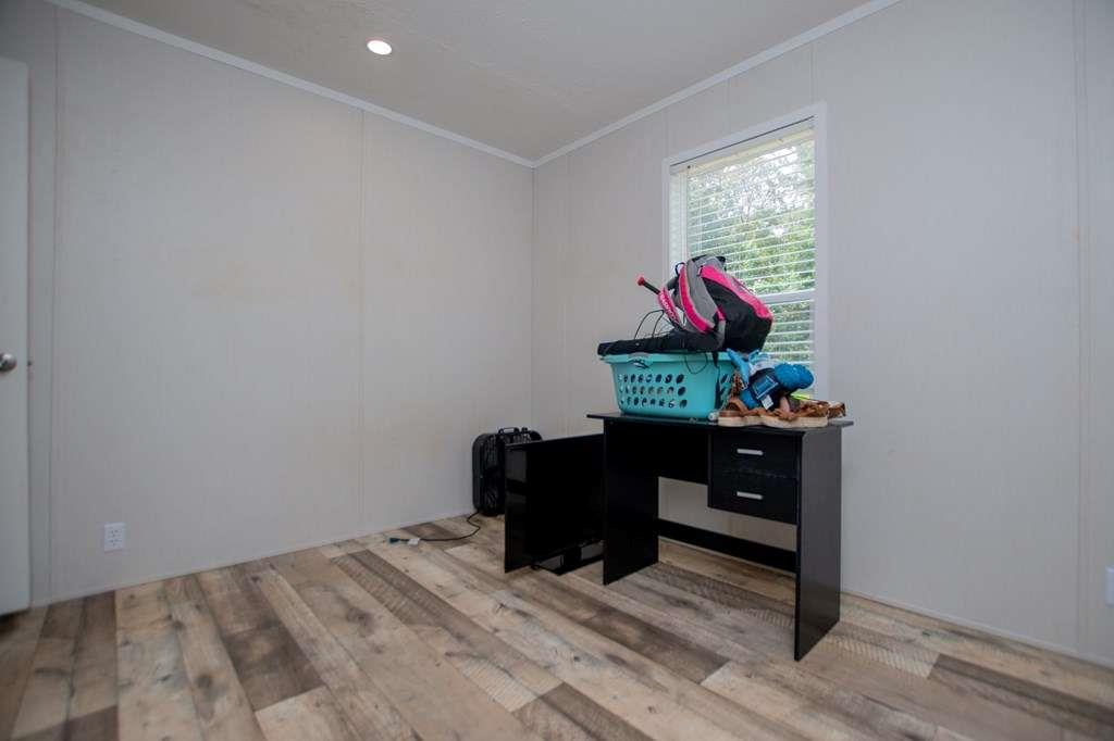 200 Duck Pond Road Roopville, GA 30170 - Photo 66 of 89 a bedroom with a bed and a dresser