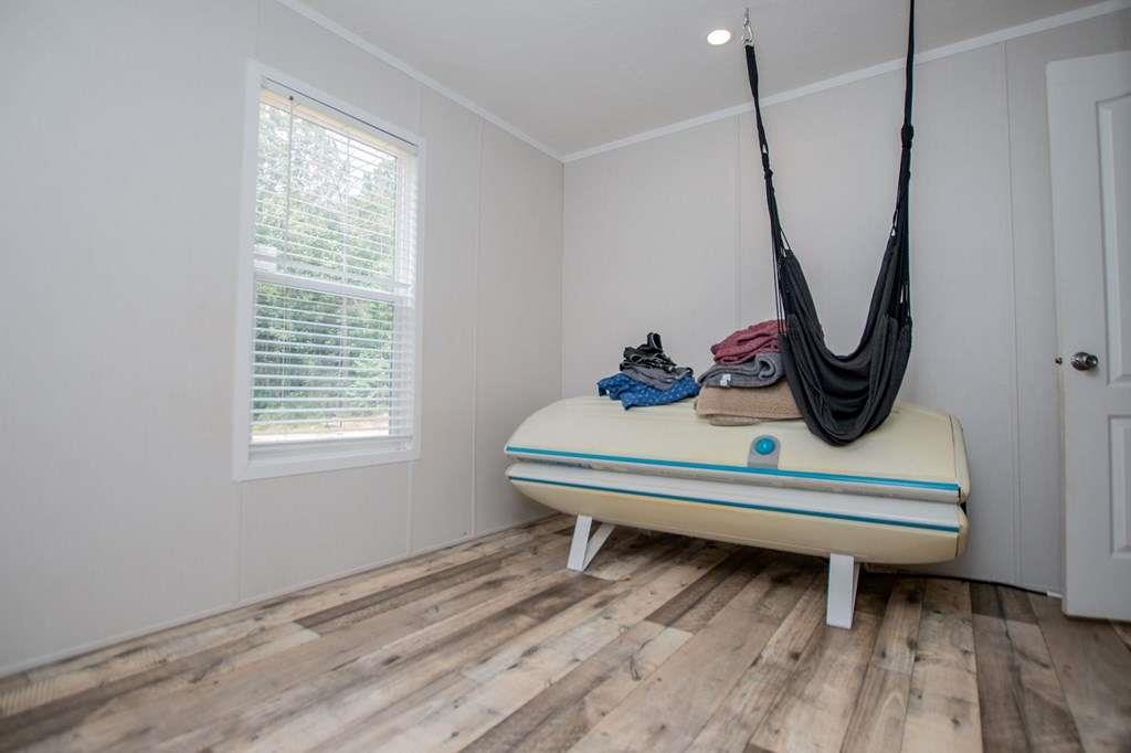 200 Duck Pond Road Roopville, GA 30170 - Photo 69 of 89 a view of a room with a window and wooden floor