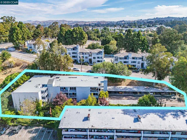 an aerial view of a house with a garden