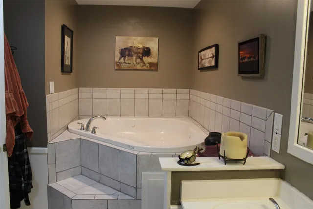 a bathroom with a sink and bathtub