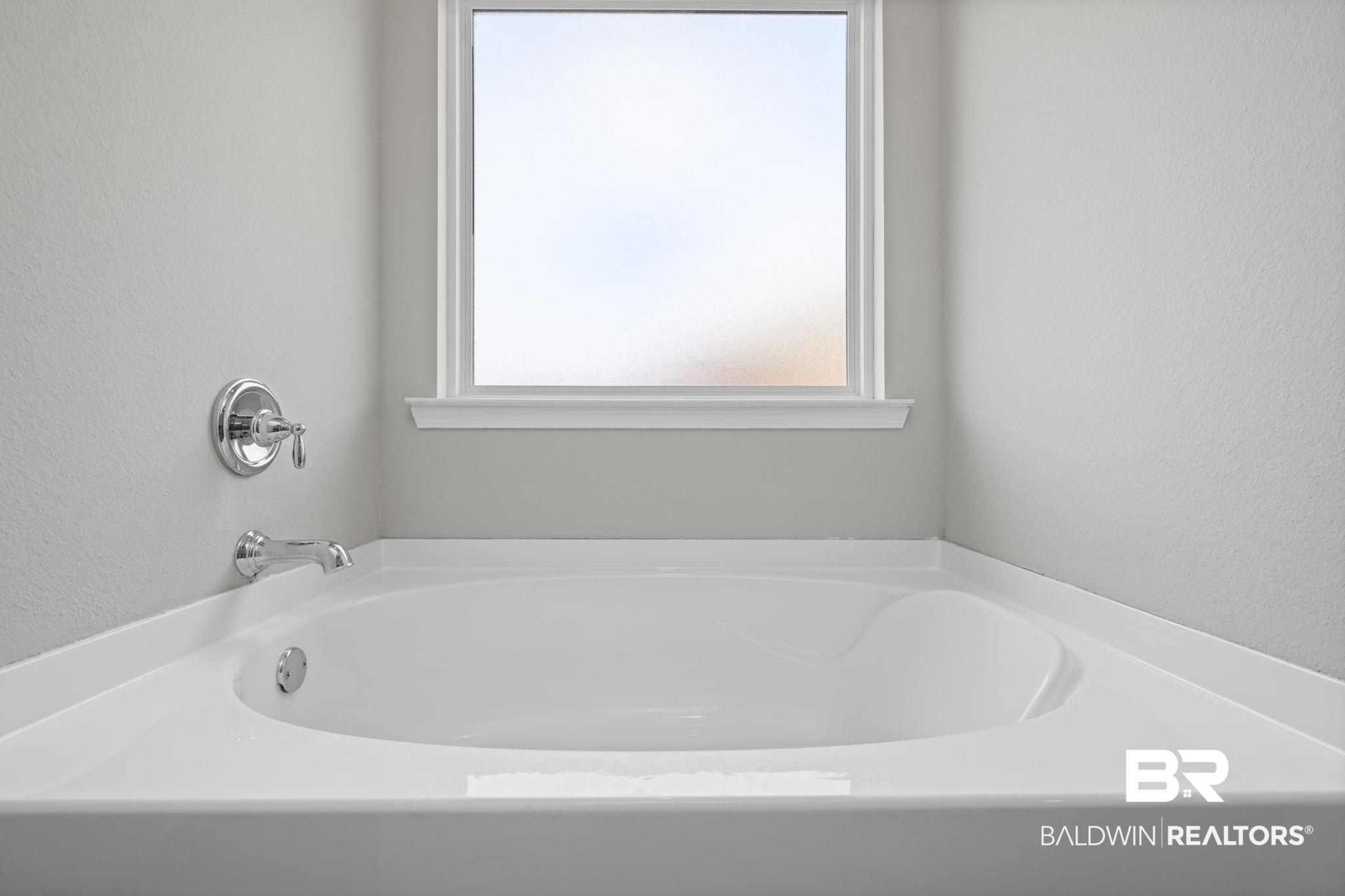 2183 Meadowview Loop Semmes, AL 36575 - Photo 46 of 58 Full bathroom featuring a textured wall and a garden tub