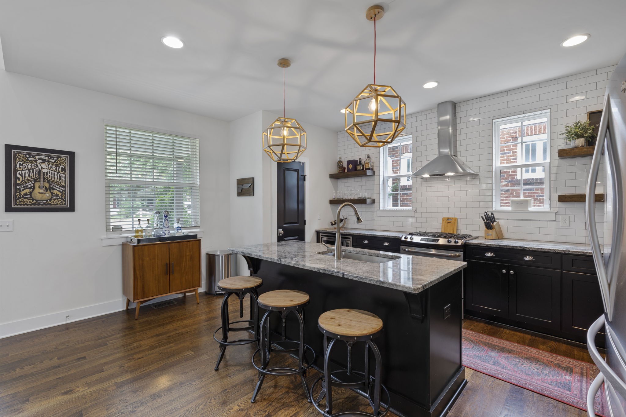 3209 Kinross Avenue Nashville, TN 37211 - Photo 14 of 48 a kitchen with a dining table and chairs in it