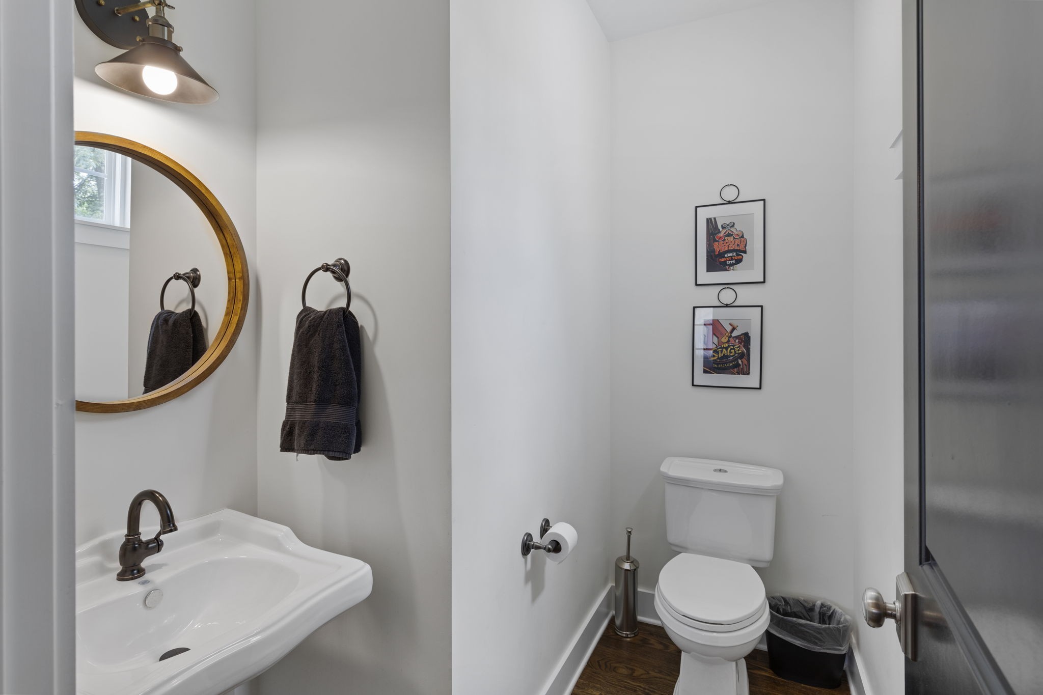3209 Kinross Avenue Nashville, TN 37211 - Photo 19 of 48 a bathroom with a toilet sink and mirror