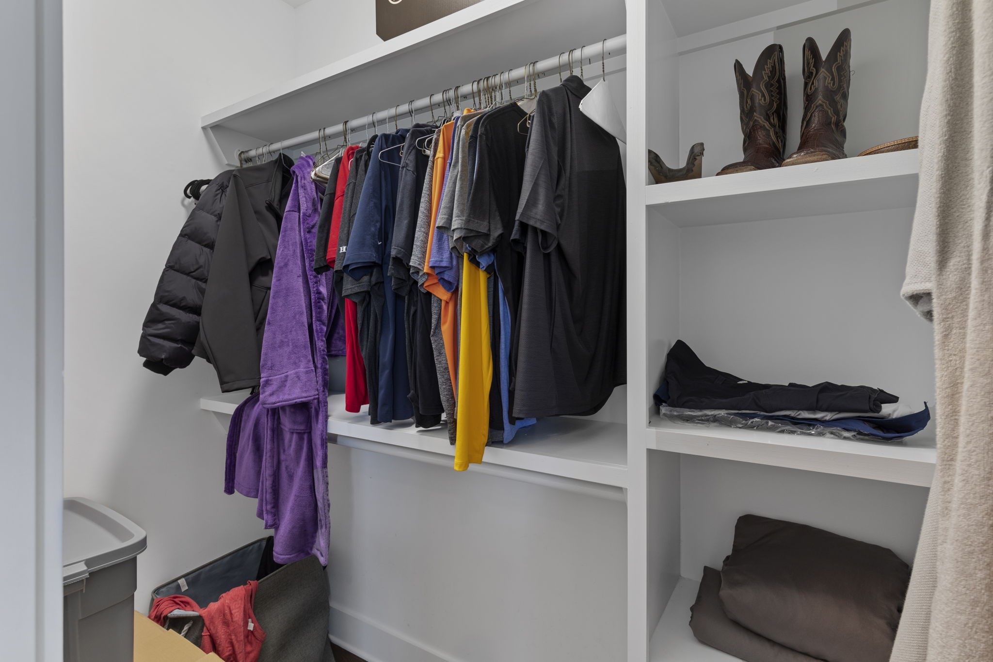 3209 Kinross Avenue Nashville, TN 37211 - Photo 20 of 48 a view of walk in closet with clothes and shoes