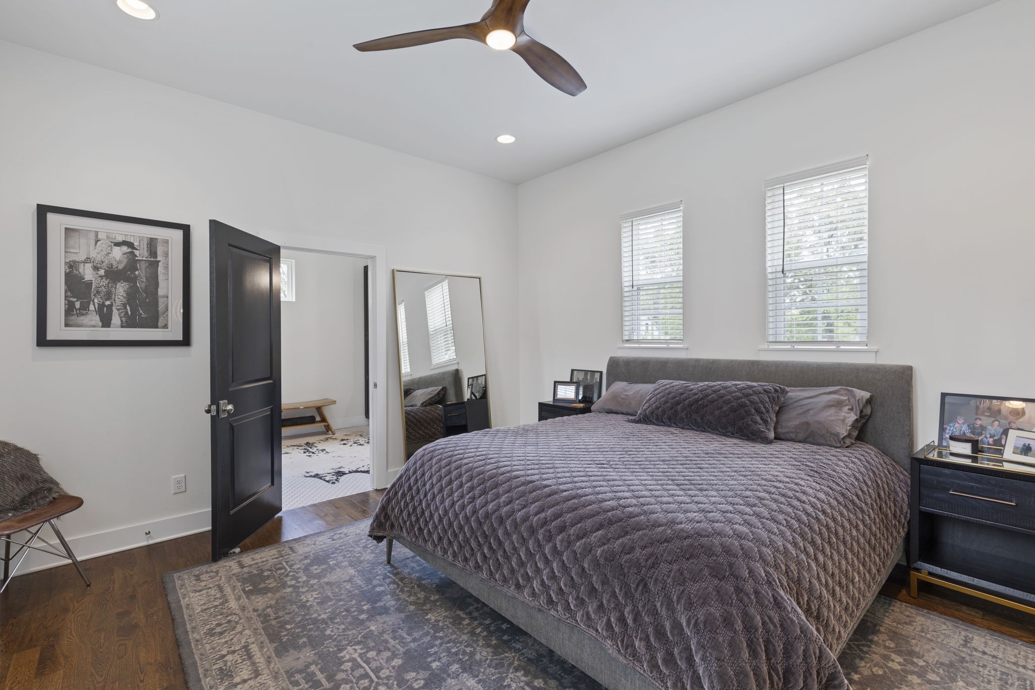 3209 Kinross Avenue Nashville, TN 37211 - Photo 23 of 48 a bedroom with a large bed a chandelier and window