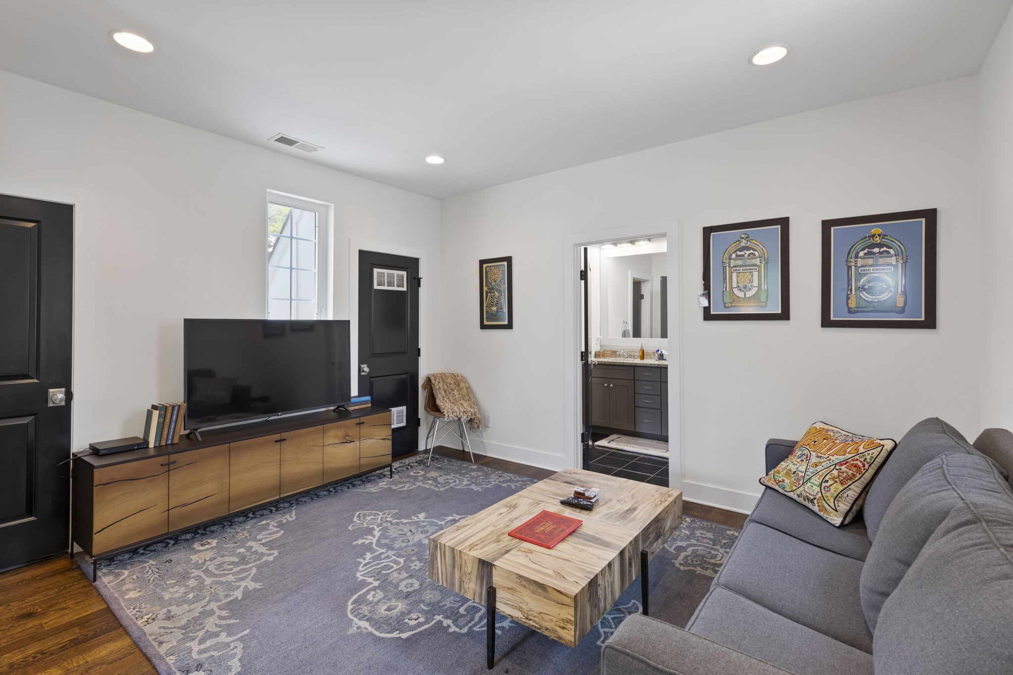 3209 Kinross Avenue Nashville, TN 37211 - Photo 29 of 48 a living room with furniture and a flat screen tv