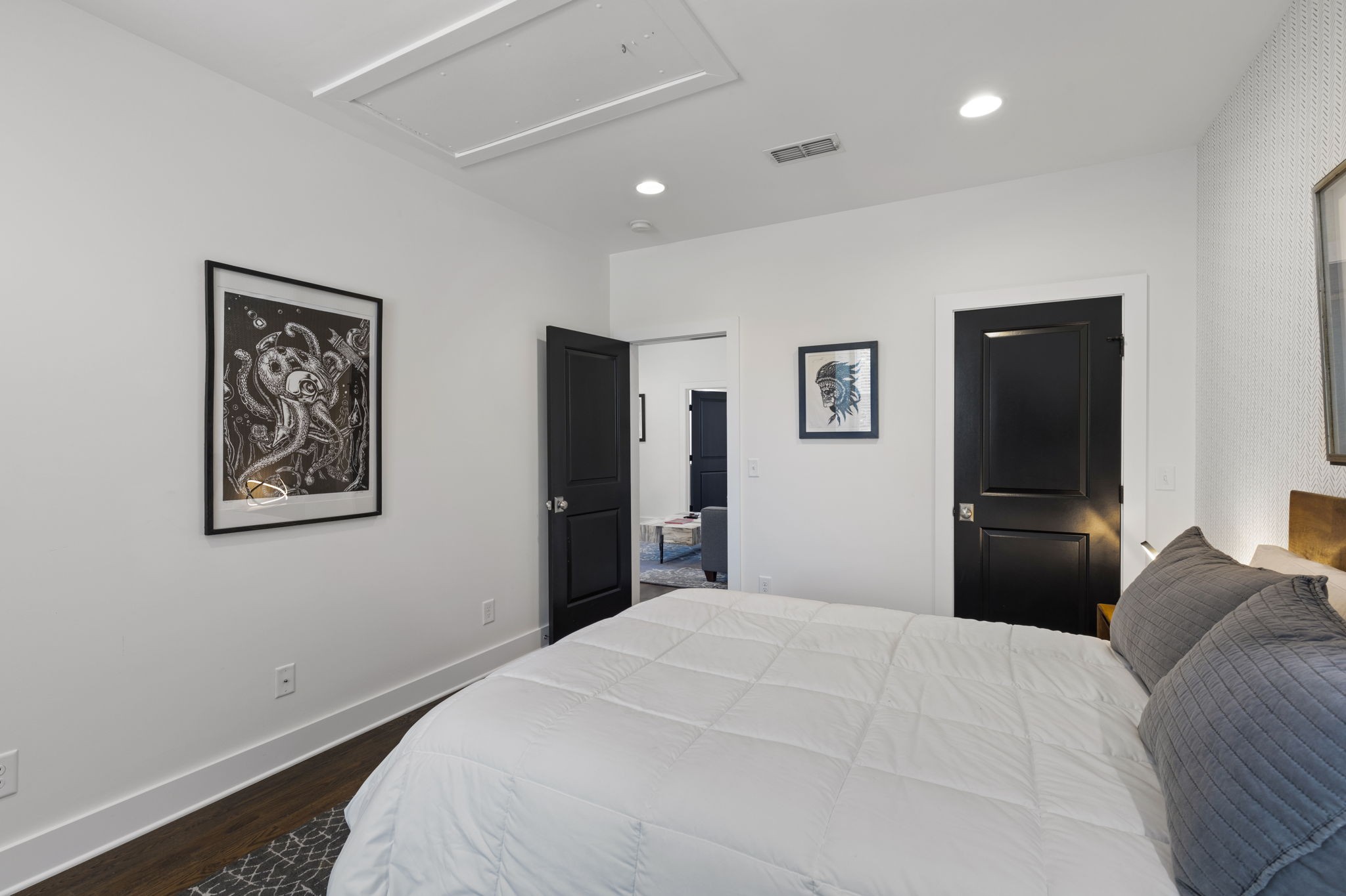 3209 Kinross Avenue Nashville, TN 37211 - Photo 38 of 48 a bedroom with a bed and a painting on the wall