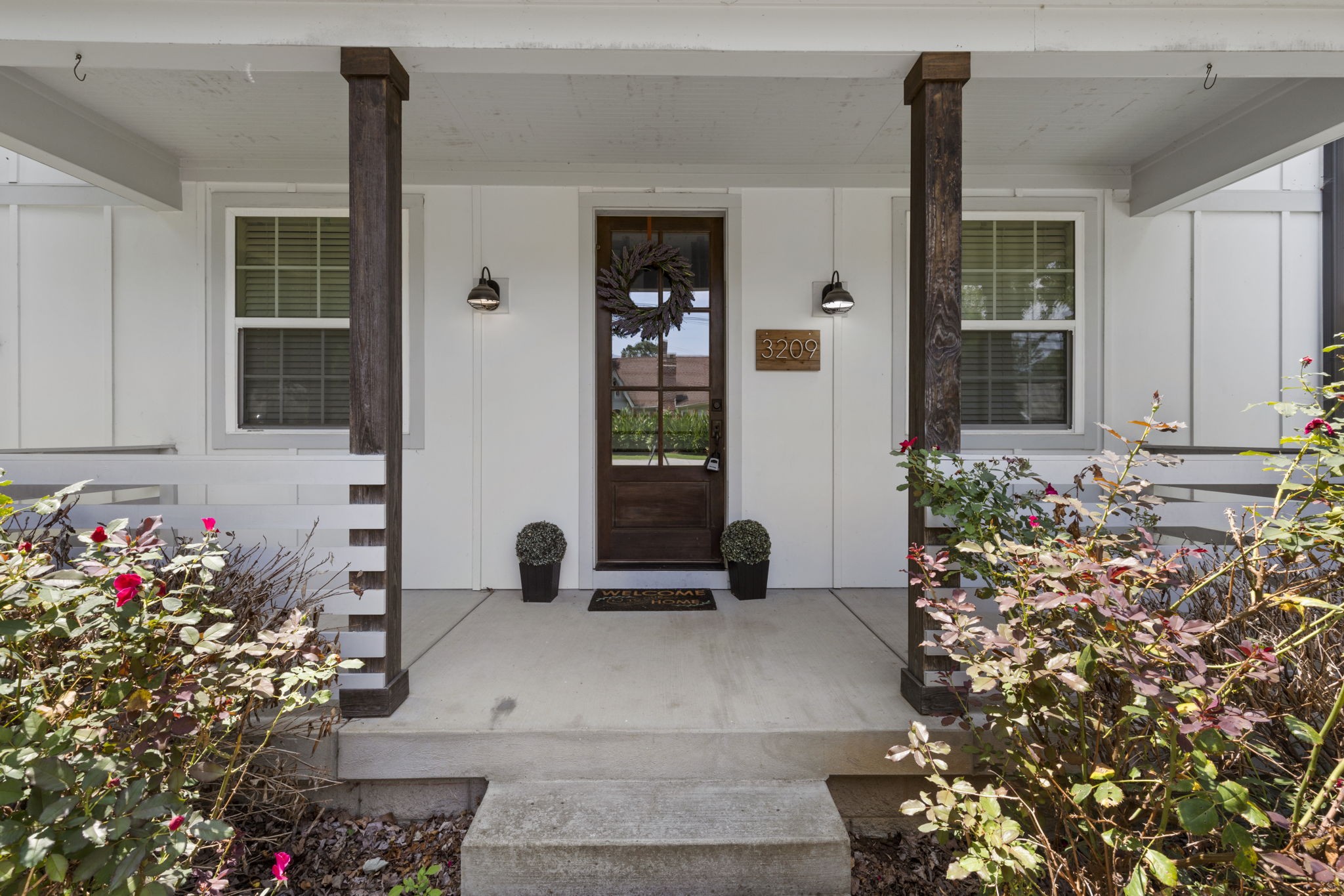3209 Kinross Avenue Nashville, TN 37211 - Photo 6 of 48 front view of a house with a potted plant