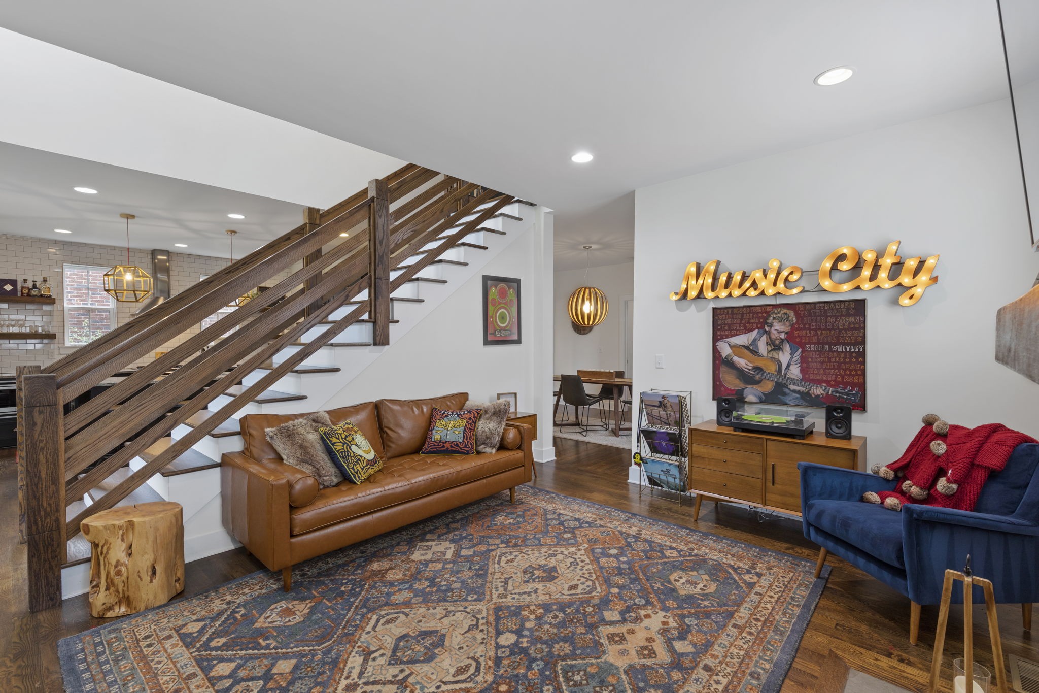 3209 Kinross Avenue Nashville, TN 37211 - Photo 8 of 48 a living room with furniture and a flat screen tv