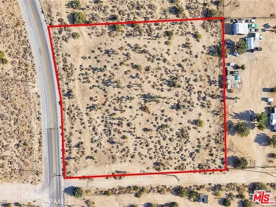 875 Locust Road Pinon Hills, CA 92372 - Photo 2 of 10 a view of a wooden door