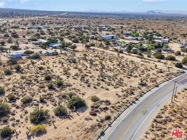 a view of a backyard of a house