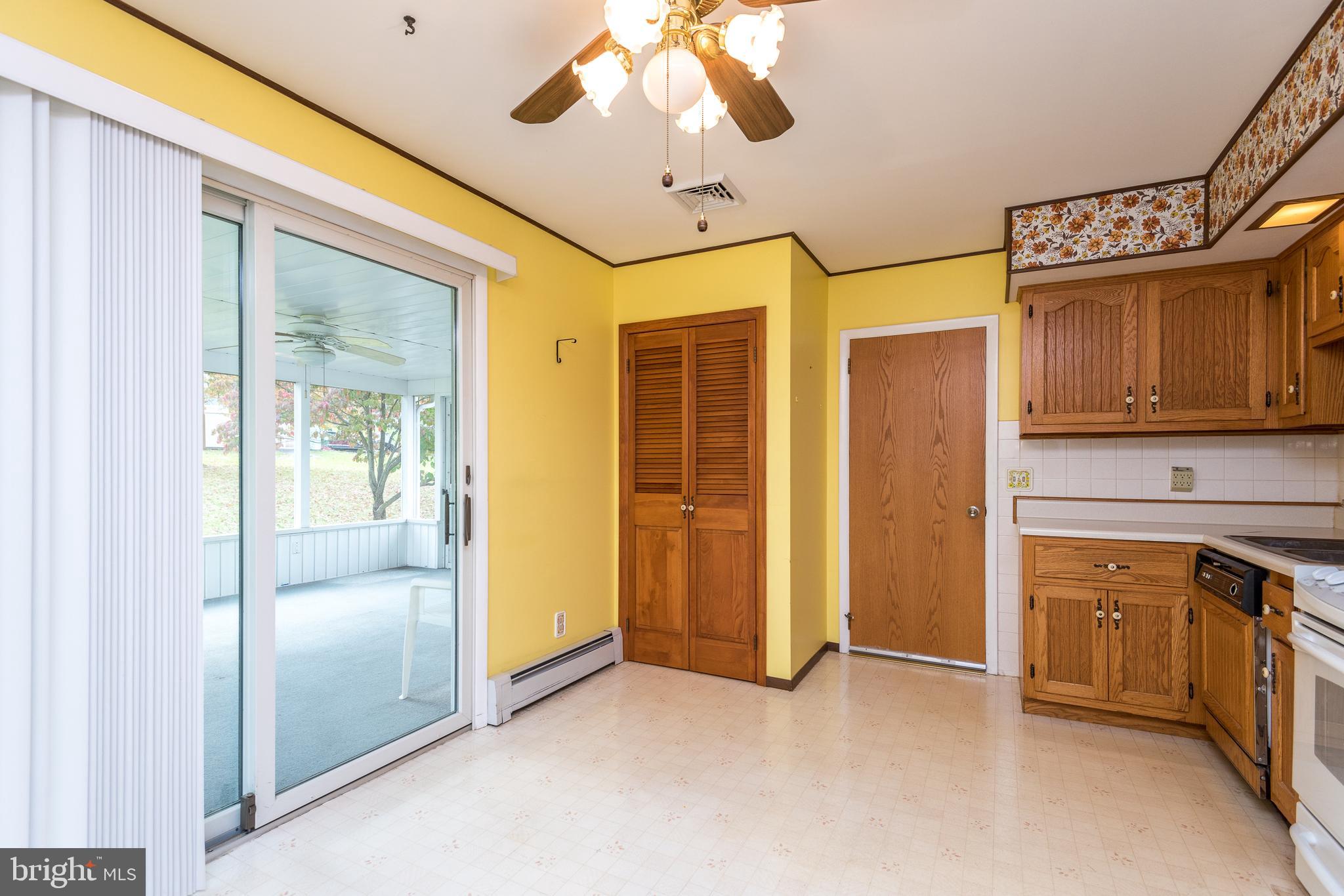 858 Rising Sun Road Telford, PA 18969 - Photo 8 of 23 Kitchen w/Sliders to 3 Season Porch