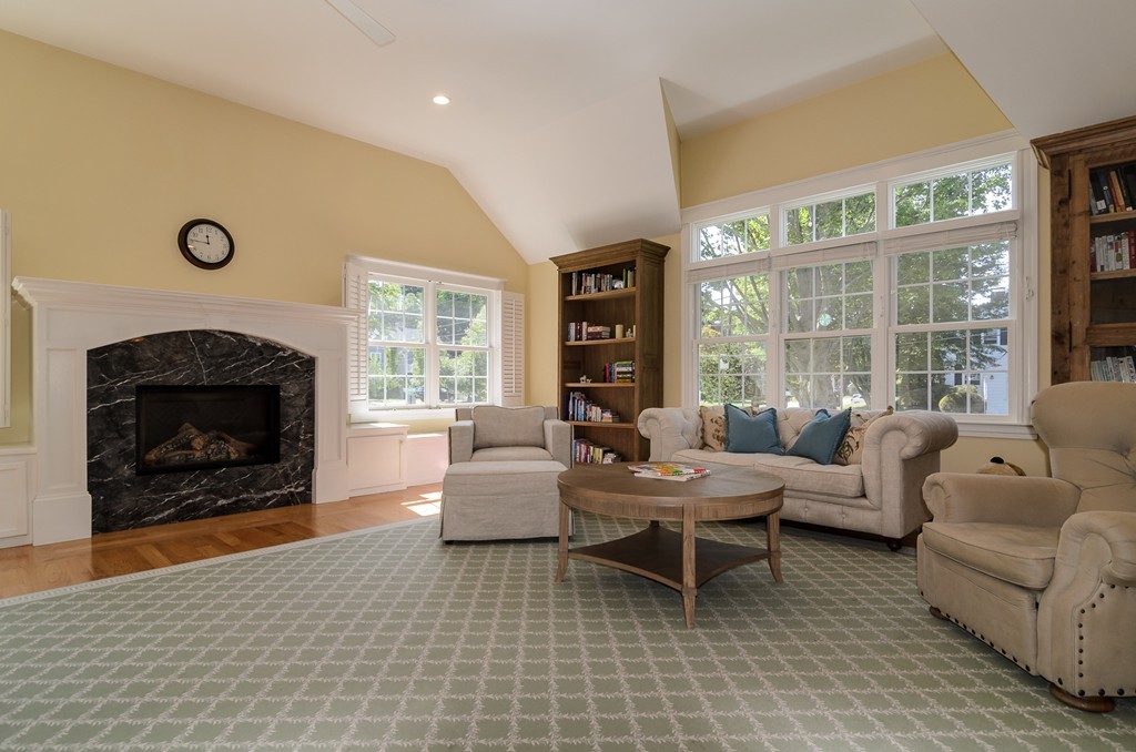 40 Burnside Road Needham, MA 02494 - Photo 8 of 24 a living room with furniture and a fireplace