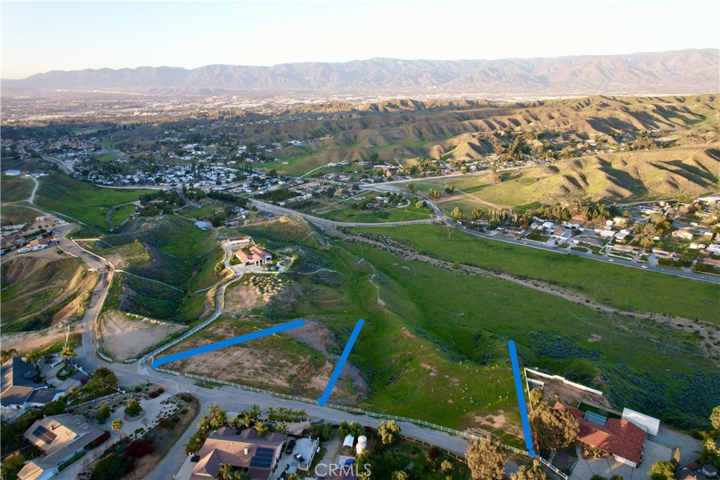 7260 Luane Trail Colton, CA 92324 - Photo 4 of 4 an aerial view of lake residential house with swimming pool and green space