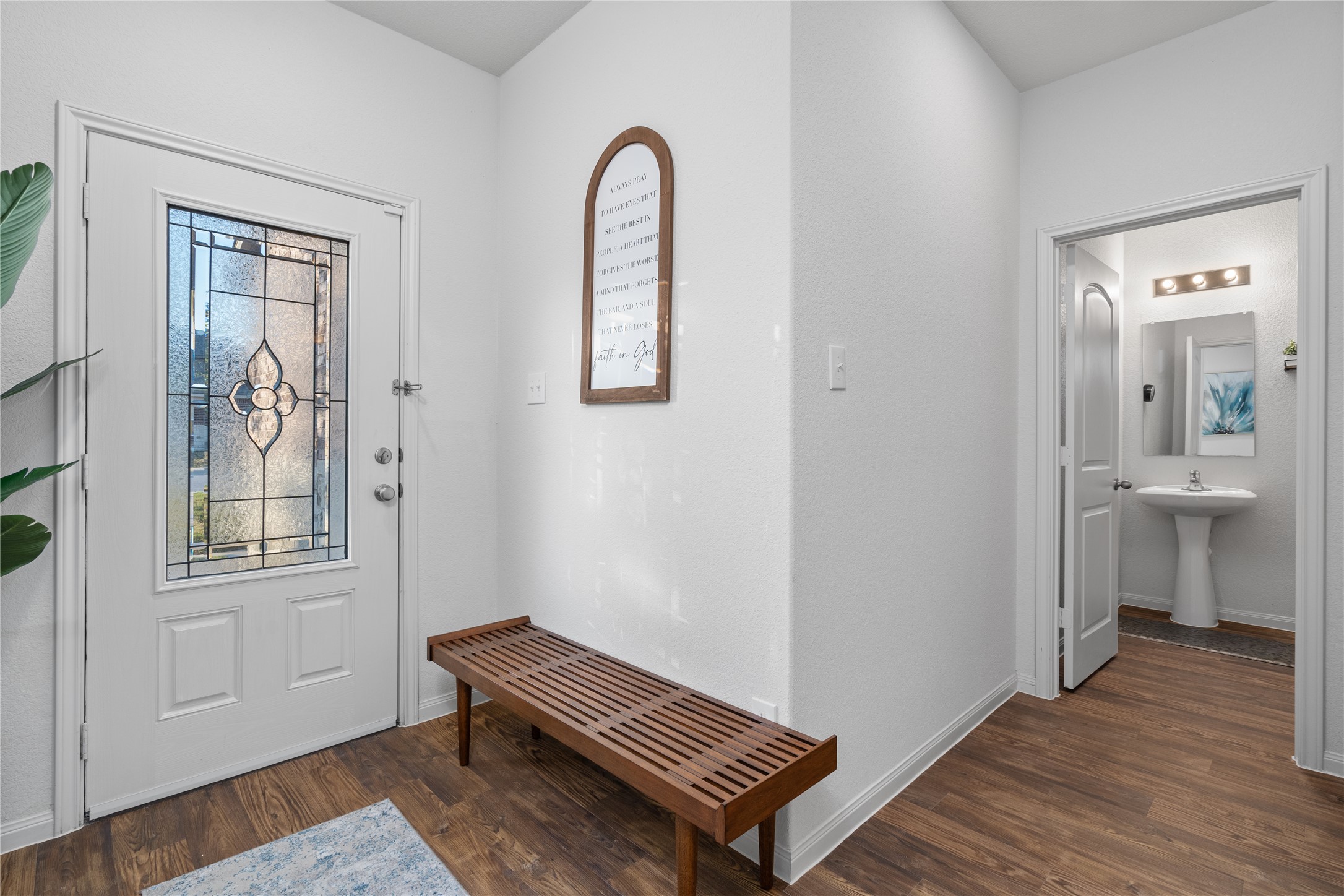 20205 Grover Cleveland Way Manor, TX 78653 - Photo 13 of 26 a room with window and wooden floor