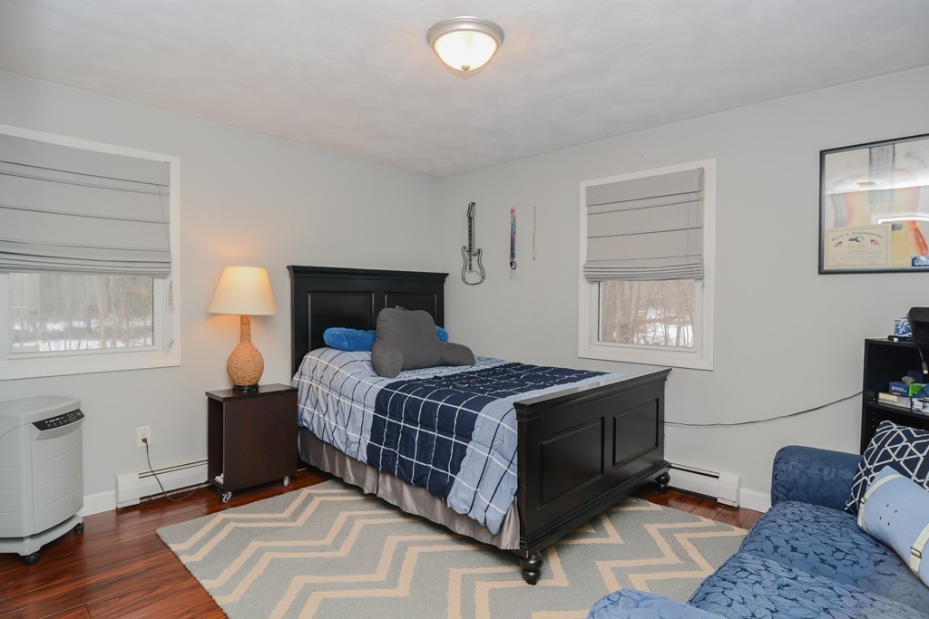 199 Center Bridge Road Lancaster, MA 01523 - Photo 18 of 30 a bedroom with a bed and window