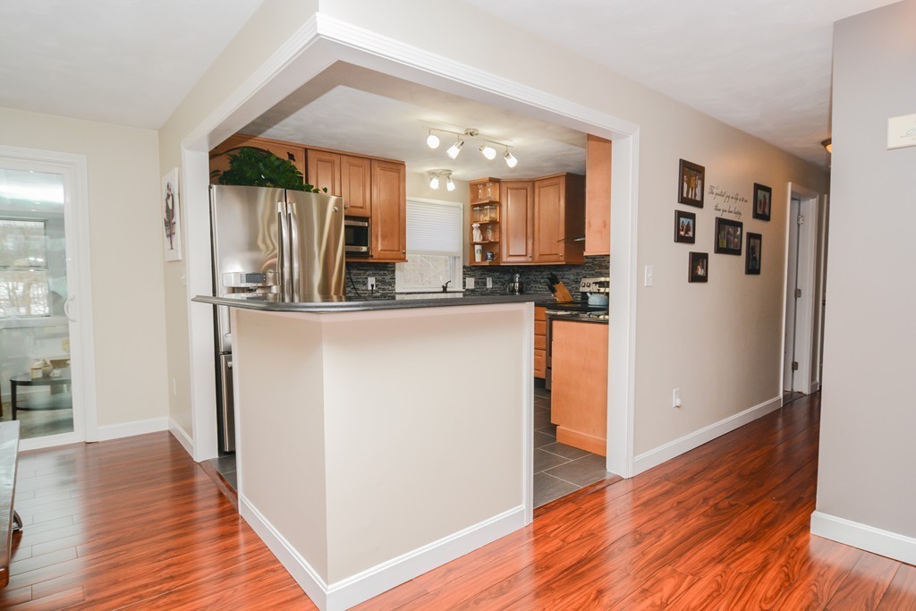 199 Center Bridge Road Lancaster, MA 01523 - Photo 10 of 30 a kitchen with stainless steel appliances granite countertop a refrigerator and a sink