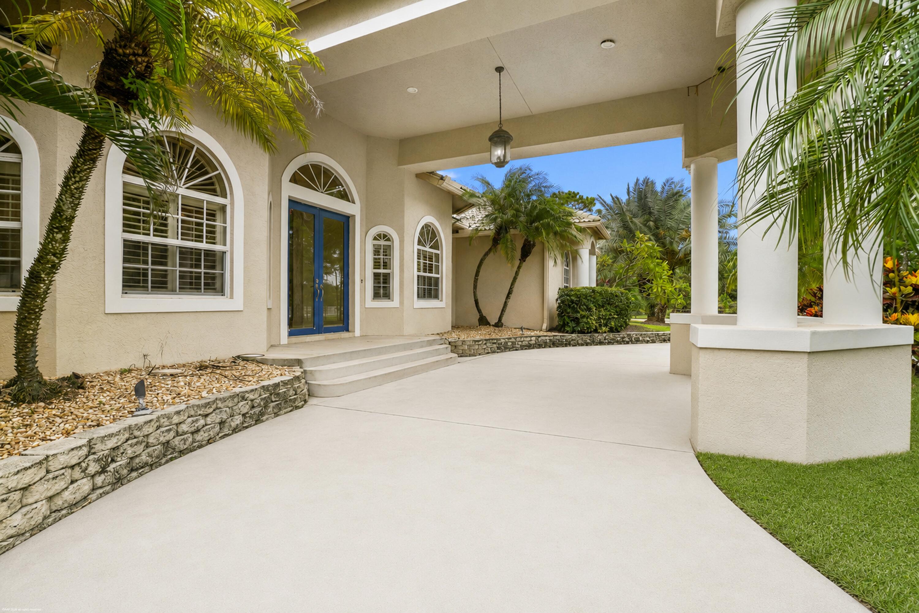 2560 Buck Ridge Trail Loxahatchee, FL 33470 - Photo 8 of 65 Covered Entry
