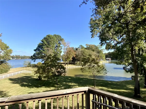 a view of a lake from a balcony