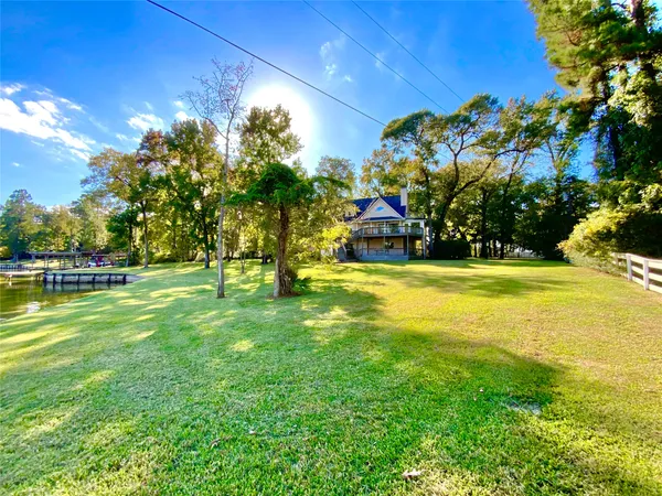 a view of swimming pool with an outdoor space and seating area