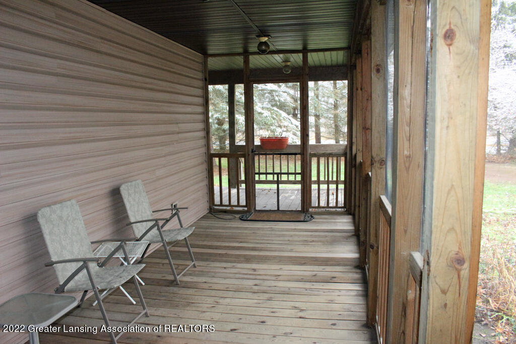 1164 Haslett Road Williamston, MI 48895 - Photo 2 of 28 Haslett Screened Porch 2