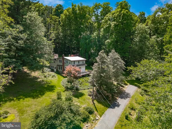 a view of a backyard of the house
