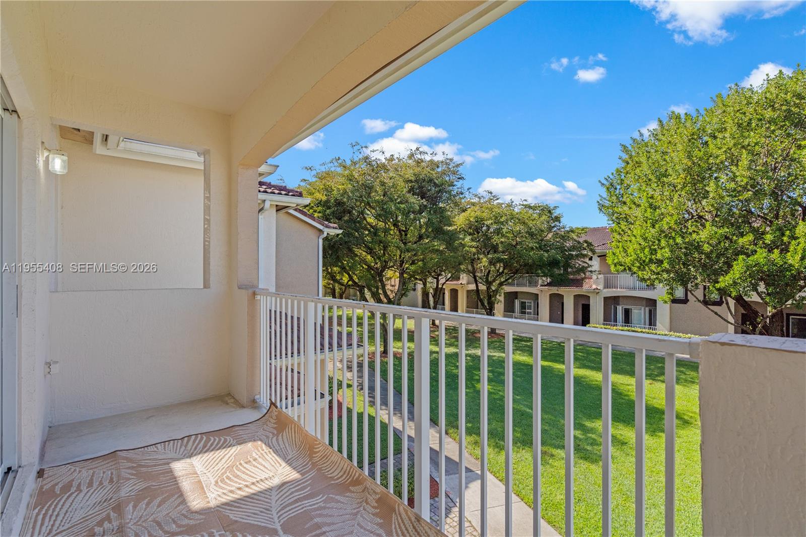 1940 Southeast 24th Terrace Homestead, FL 33035 - Photo 22 of 29 a view of a house with a balcony