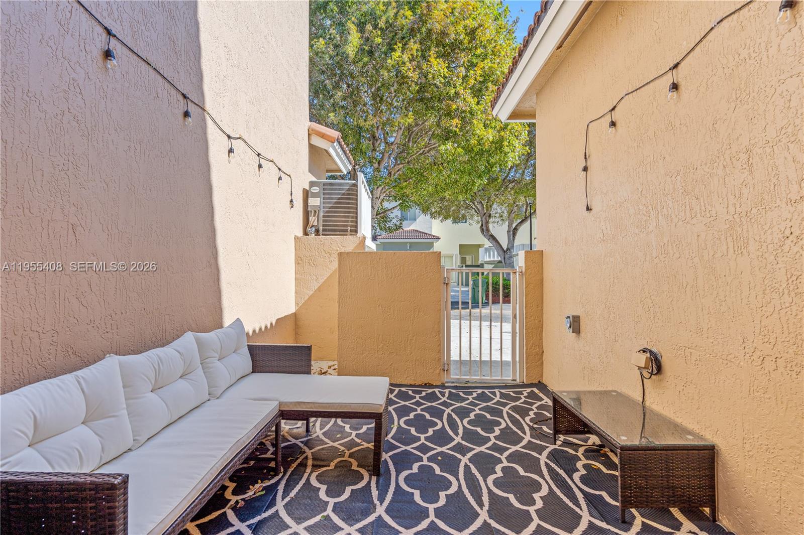 1940 Southeast 24th Terrace Homestead, FL 33035 - Photo 24 of 29 a bedroom with a bed and a couch