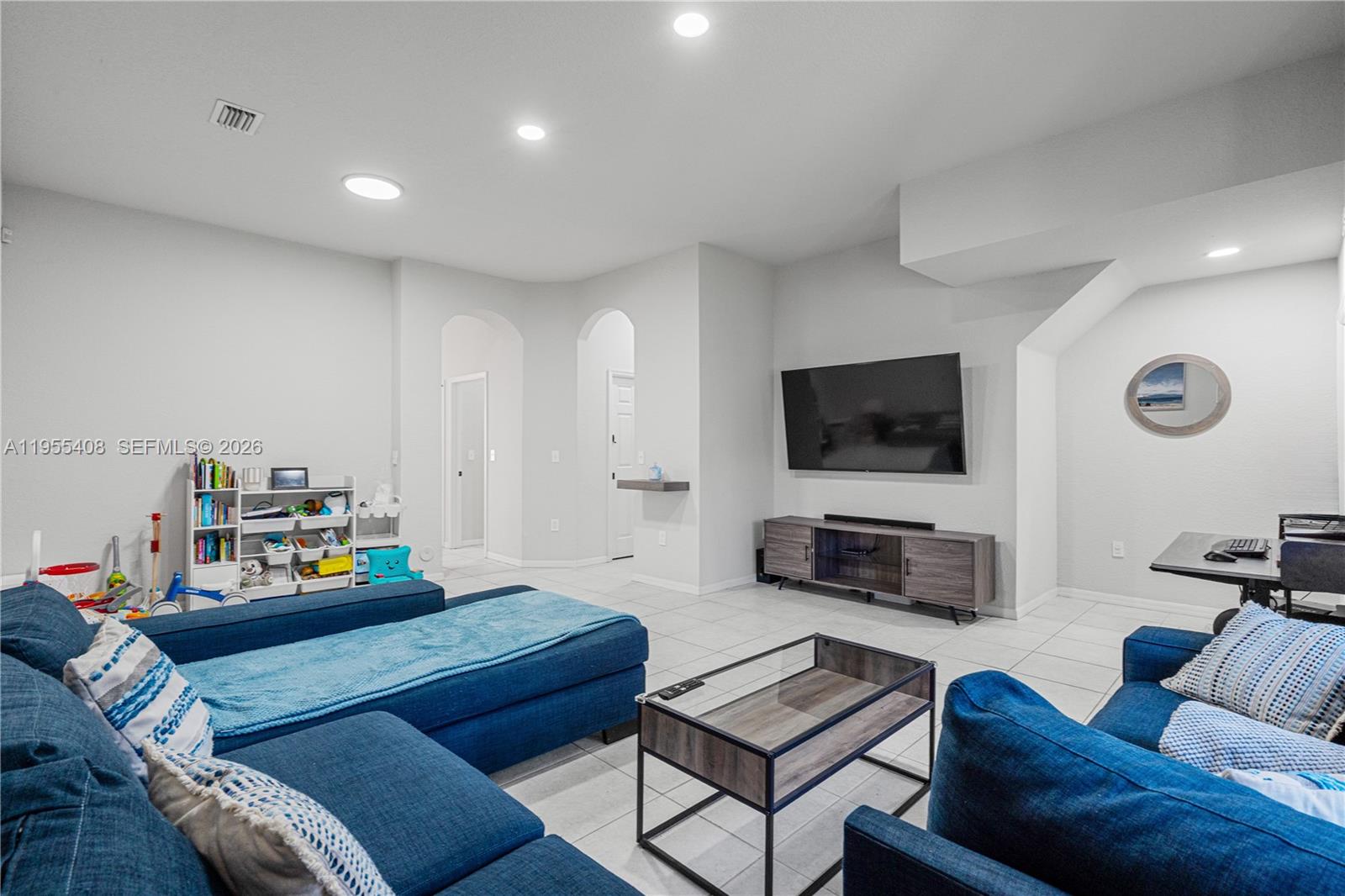 1940 Southeast 24th Terrace Homestead, FL 33035 - Photo 4 of 29 a living room with furniture and a flat screen tv