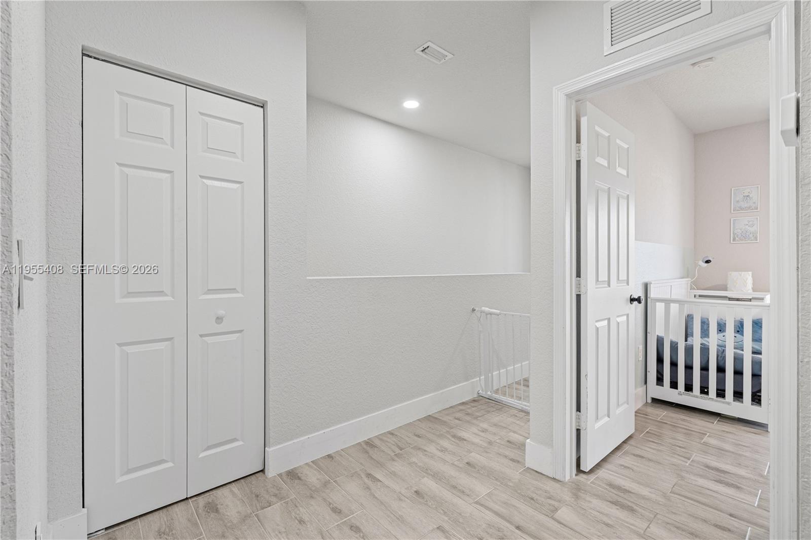 1940 Southeast 24th Terrace Homestead, FL 33035 - Photo 10 of 29 wooden floor in an empty room