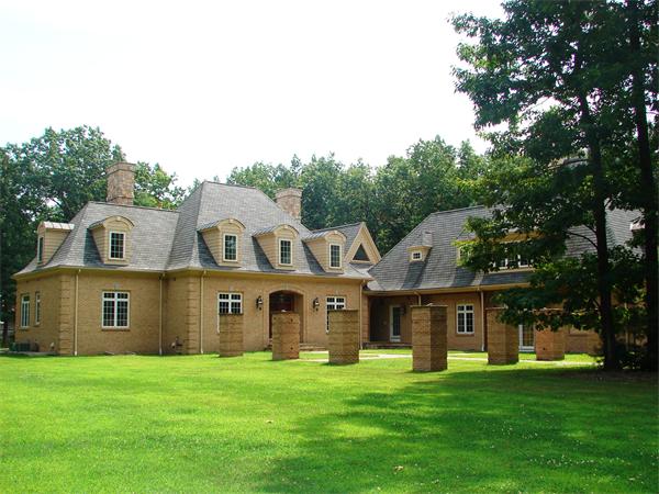 95 Fox Run Road Bolton, MA 01740 - Photo 1 of 25 a front view of a house with a garden