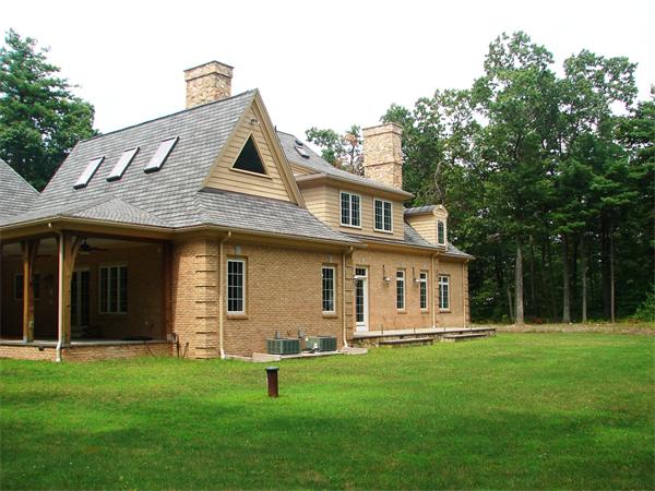 95 Fox Run Road Bolton, MA 01740 - Photo 23 of 25 a view of an house with backyard space and garden