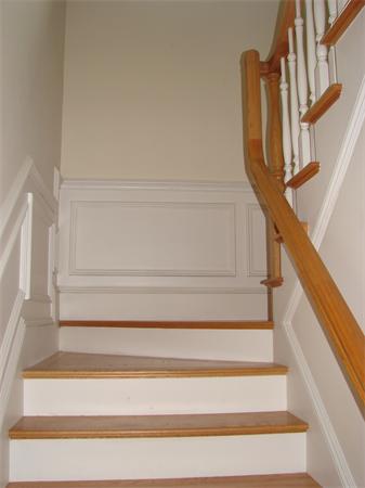 95 Fox Run Road Bolton, MA 01740 - Photo 8 of 25 a view of staircase with white walls and a window