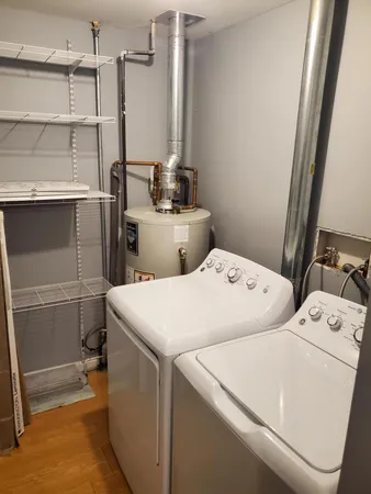 a utility room with dryer and washer