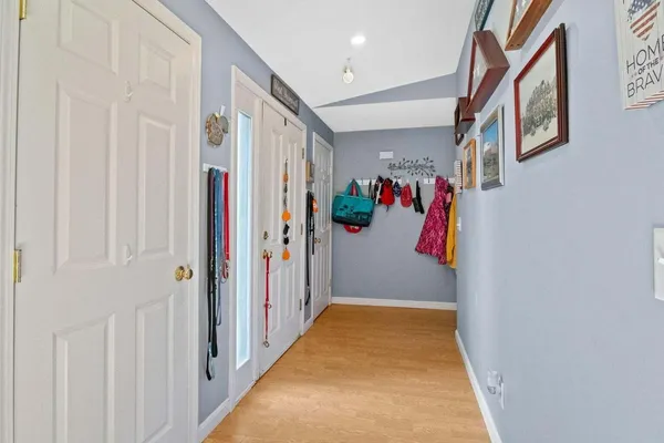 a view of a hallway with hallway and stairs