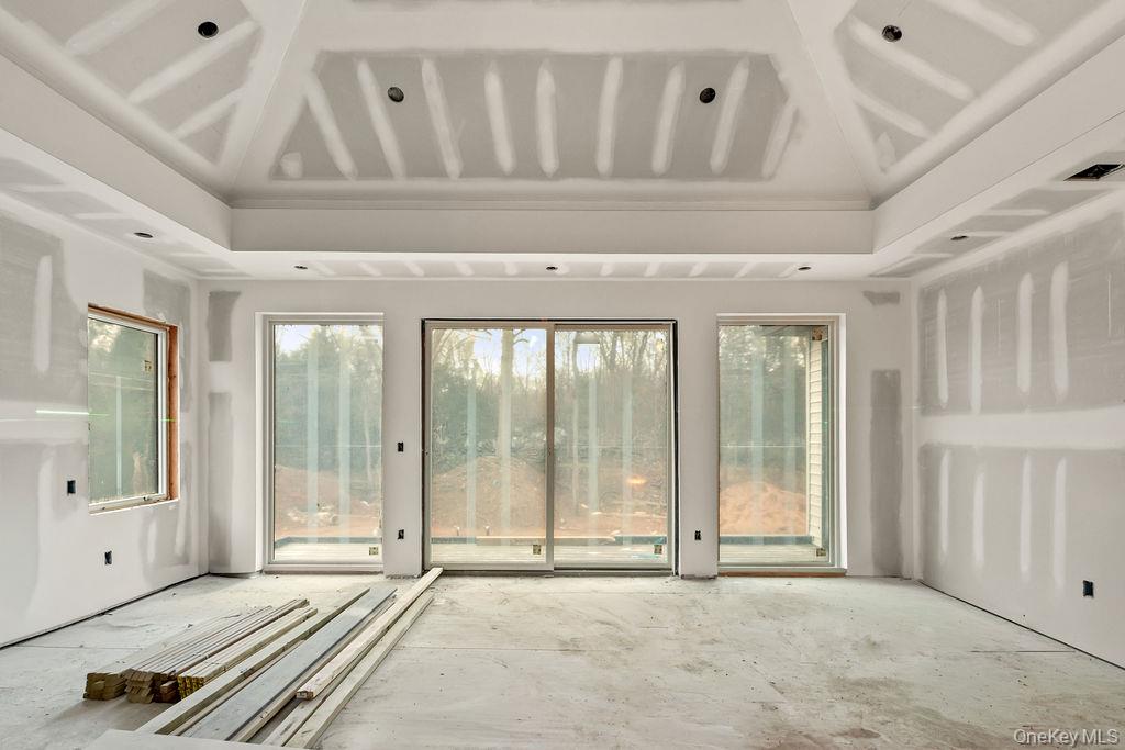 94 Viola Road Suffern, NY 10901 - Photo 13 of 19 a view of an empty room with a window