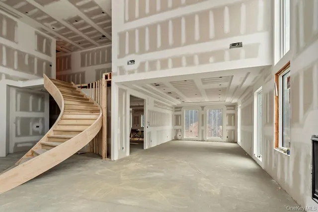 a view of an entryway with staircase