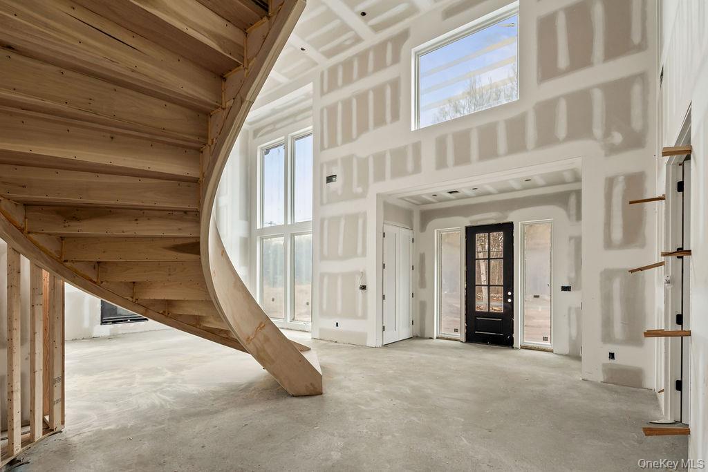 94 Viola Road Suffern, NY 10901 - Photo 3 of 19 a view of an entryway with a stairs