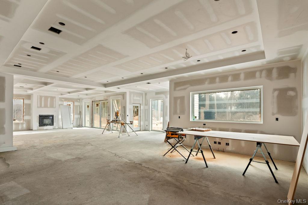 94 Viola Road Suffern, NY 10901 - Photo 9 of 19 a living room with furniture and a large window