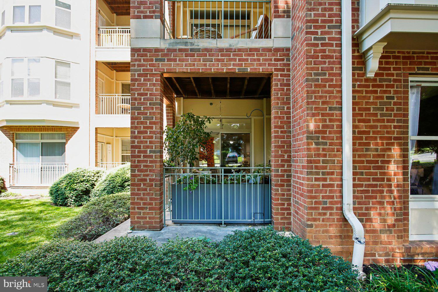 1855 Stratford Park Place, Unit 103 Reston, VA 20190 - Photo 38 of 49 Back Elevation