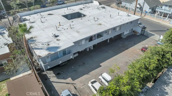 a view of balcony with wooden floor