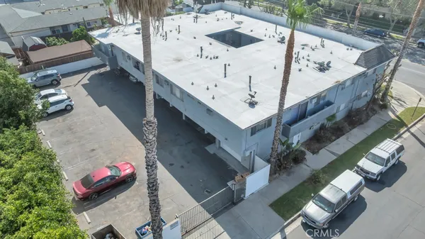 an aerial view of a house with outdoor space