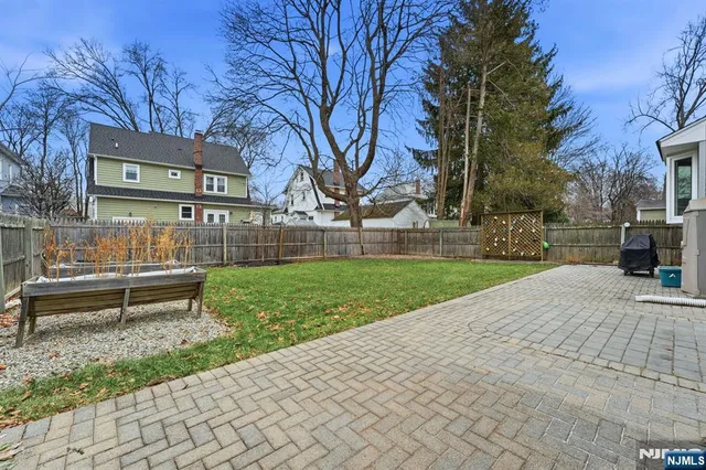 a garden view with a bench