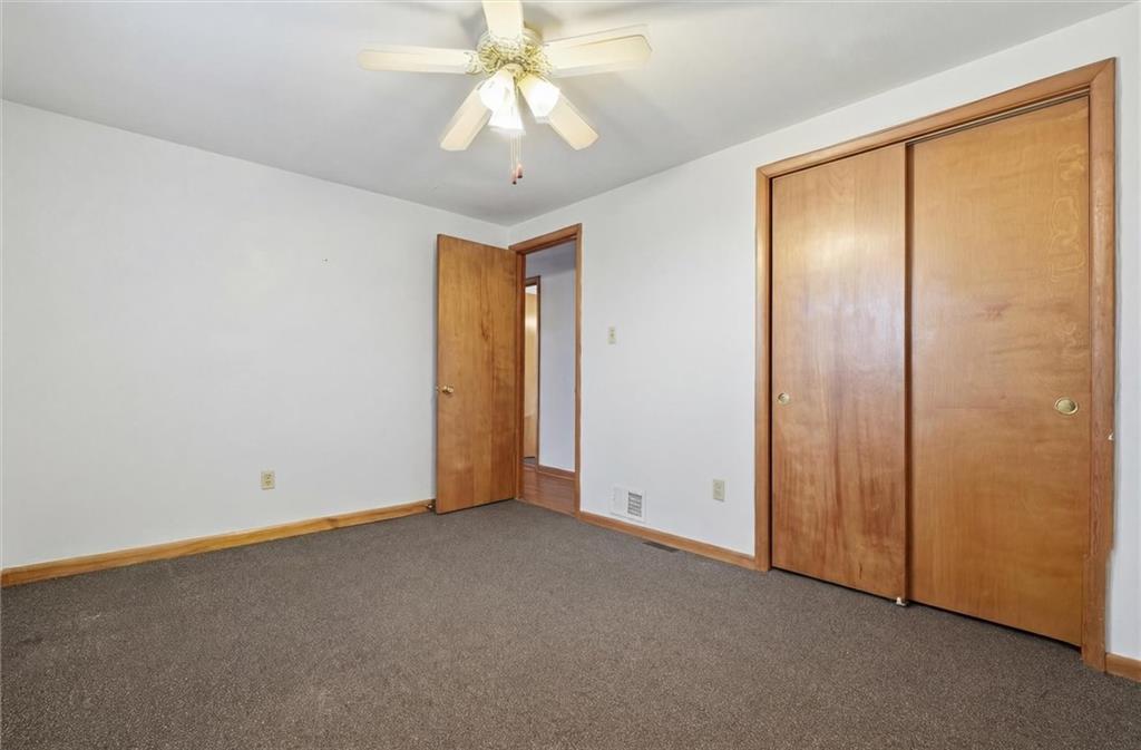 51 Revo Road Pittsburgh, PA 15236 - Photo 17 of 29 an empty room with a chandelier fan
